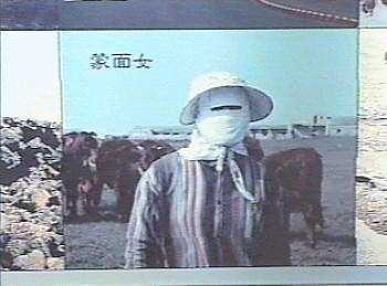 蒙面女 攝影：簡時強